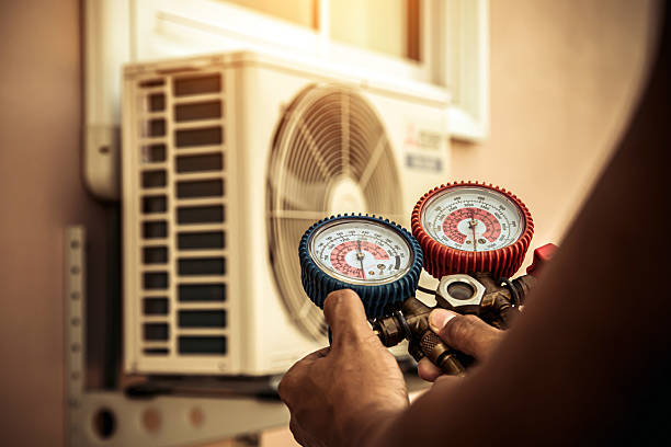 Professional Air Conditioning Service technician working in Spanish Fork, UT
